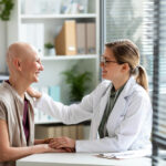 Cancer patient with doctor